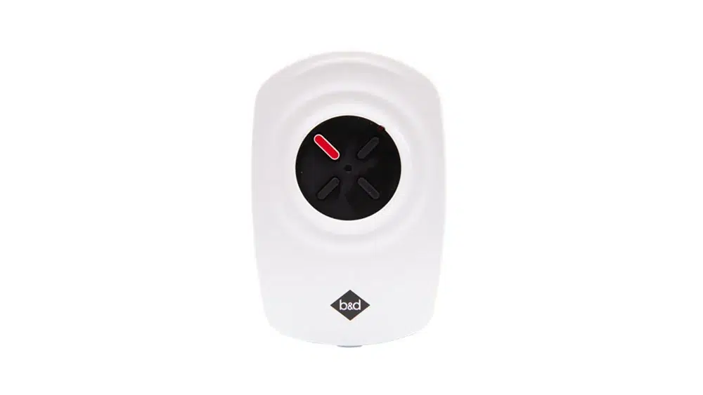 White B&D wall mount garage door remote control
